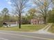 Charming stone and brick home with a cozy and inviting exterior at 1823 E Geer St, Durham, NC 27704