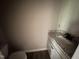 Small bathroom with grey countertops and a sink with white cabinets at 192 Royal Ave, Selma, NC 27576
