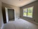 Comfortable bedroom with a closet and a window at 192 Royal Ave, Selma, NC 27576