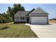 Charming one-story home with a two-car garage and covered porch at 192 Royal Ave, Selma, NC 27576