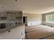 Spacious kitchen with a granite countertop breakfast bar, ample cabinetry, and an adjacent dining area at 192 Royal Ave, Selma, NC 27576