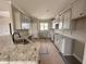 Well-equipped kitchen featuring granite countertops, stainless steel sink, and plenty of cabinet space at 192 Royal Ave, Selma, NC 27576