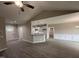 Open-concept living space featuring stylish floors and a kitchen bar at 192 Royal Ave, Selma, NC 27576