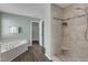 Bathroom with tub and tile shower at 2002 Patapsco Dr, Apex, NC 27523