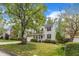 Charming two-story home with lush green lawn and a welcoming front porch at 2002 Patapsco Dr, Apex, NC 27523
