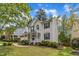 Attractive two-story home with well-maintained landscaping and inviting front porch at 2002 Patapsco Dr, Apex, NC 27523