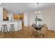 The sunny breakfast area is conveniently next to the kitchen with bar seating and granite countertops at 2002 Patapsco Dr, Apex, NC 27523
