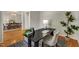 This home office features natural lighting, and an open floor plan to the dining room at 2002 Patapsco Dr, Apex, NC 27523