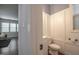 Powder room featuring neutral paint, wainscoting, and tile floors at 2012 Longmont Dr, Wake Forest, NC 27587