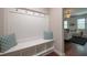 Comfortable entryway area with a built-in bench and coat hooks provides an organized transition into the home at 2012 Longmont Dr, Wake Forest, NC 27587