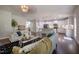 Bright living room showing the open floor plan into the kitchen and stairway at 2012 Longmont Dr, Wake Forest, NC 27587