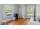 Bedroom with hardwood floors, two windows and a closet at 206 Mansfield Dr, Broadway, NC 27505