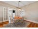 Dining room featuring a table for four and access to the living room at 206 Mansfield Dr, Broadway, NC 27505