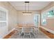 Cozy dining room with chandelier and built-in cabinet is great for entertaining at 206 Mansfield Dr, Broadway, NC 27505