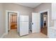 Neutral kitchen with an appliance, doors and openings to other rooms in the house at 206 Mansfield Dr, Broadway, NC 27505