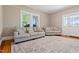 Comfortable living room with neutral decor and ample seating for guests at 206 Mansfield Dr, Broadway, NC 27505