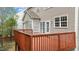 A spacious wood deck perfect for outdoor relaxation and entertaining with views of the yard at 211 Kurtner Ct, Morrisville, NC 27560