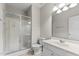 Clean bathroom featuring a glass enclosed shower, tile floors, and a white vanity at 211 Kurtner Ct, Morrisville, NC 27560