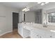 Bright bathroom with a double vanity, ample storage, and separate water closet at 211 Kurtner Ct, Morrisville, NC 27560