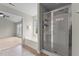 Bathroom featuring shower, separate tub, and doorway to the large bedroom at 211 Kurtner Ct, Morrisville, NC 27560