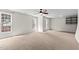 Large bedroom with neutral walls, carpet and large windows providing lots of light at 211 Kurtner Ct, Morrisville, NC 27560