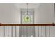 An entryway with a large window and chandelier provides ample natural light at 211 Kurtner Ct, Morrisville, NC 27560