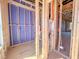 Under construction view of the bedroom's framing with electrical wires and plumbing at 221 Pond View Ct # 9, Fuquay Varina, NC 27526