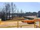 Exterior view of the surrounding landscape with pond and green spaces at 221 Pond View Ct # 9, Fuquay Varina, NC 27526