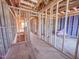 Unfinished interior with visible framing and utilities, allowing a unique opportunity for customized design and layout at 221 Pond View Ct # 9, Fuquay Varina, NC 27526