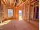 Under construction view of the home's framing with windows looking out to the exterior at 221 Pond View Ct # 9, Fuquay Varina, NC 27526