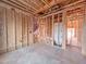 Unfinished room framing including a stairwell and visible utilities awaiting completion at 221 Pond View Ct # 9, Fuquay Varina, NC 27526