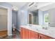 The bathroom offers double sinks, a large mirror, and a separate toilet room at 223 Triumph Dr, Elon, NC 27244