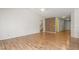 Bright living area with hardwood flooring, neutral walls, offering a blank canvas for personalized décor at 223 Triumph Dr, Elon, NC 27244