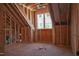 View of unfinished bedroom with wooden framing, a window, and potential for customization at 2328 Ballywater Lea Way, Wake Forest, NC 27587