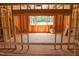 View of unfinished space with exposed wooden framing, multiple windows and construction elements at 2328 Ballywater Lea Way, Wake Forest, NC 27587