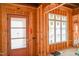 Interior shot of home under construction showing window, unfinished walls and doorway at 2328 Ballywater Lea Way, Wake Forest, NC 27587