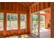 Under construction living room featuring a sliding glass door and large windows at 2328 Ballywater Lea Way, Wake Forest, NC 27587