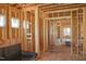 Incomplete living room construction showing internal framing, plumbing and window openings at 2328 Ballywater Lea Way, Wake Forest, NC 27587