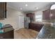 Well-equipped kitchen featuring stainless steel appliances, granite countertops, and ample cabinet space at 24 Kaki Ct, Selma, NC 27576