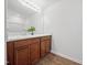 Stylish bathroom with dark wood vanity, marble countertop, modern fixtures, and contemporary lighting at 25 Beechnut Ct, Franklinton, NC 27525