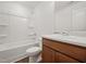 Clean bathroom with a tub and shower combo, vanity with solid surface countertop, and neutral finishes at 25 Beechnut Ct, Franklinton, NC 27525