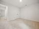 Spacious bedroom with neutral carpeting and ample closet space at 25 Beechnut Ct, Franklinton, NC 27525