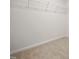 Walk-in closet with a wire shelving system and soft, neutral carpeting at 25 Beechnut Ct, Franklinton, NC 27525