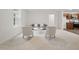 Bright living room with plush carpet, contemporary furniture, and ample natural light at 25 Beechnut Ct, Franklinton, NC 27525