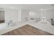 Bright living room with light-colored walls, plush carpet, and modern furnishings, creating an inviting space at 25 Beechnut Ct, Franklinton, NC 27525