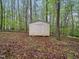 Simple shed in backyard with a single door at 25 Beechnut Ct, Franklinton, NC 27525