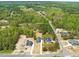 Aerial view of a neighborhood with new construction homes surrounded by lush greenery at 250 Pilot Ridge Rd, Zebulon, NC 27597
