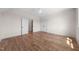 Spacious bedroom with hardwood floors and two closet doors at 250 Pilot Ridge Rd, Zebulon, NC 27597