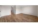 Spacious bedroom featuring hardwood floors and bright natural light at 250 Pilot Ridge Rd, Zebulon, NC 27597