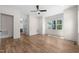 Spacious bedroom featuring hardwood floors, a large window, and neutral paint at 250 Pilot Ridge Rd, Zebulon, NC 27597